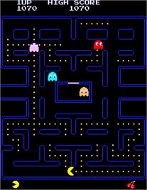 In game image of Pac-Man on the Arcade.