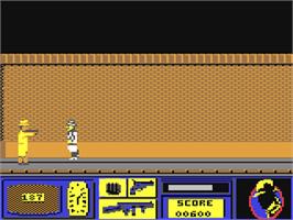 In game image of Dick Tracy on the Commodore 64.