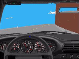 In game image of Test Drive on the Commodore Amiga.