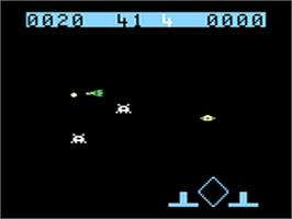 In game image of Space Raiders on the Emerson Arcadia 2001.
