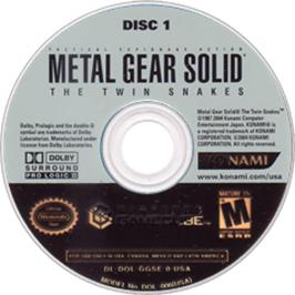 Artwork on the Disc for Metal Gear Solid: The Twin Snakes on the Nintendo GameCube.