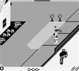 In game image of Paperboy on the Nintendo Game Boy.