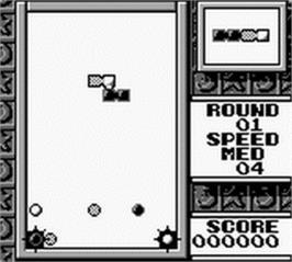 In game image of Tetris Flash on the Nintendo Game Boy.