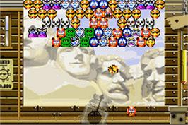 In game image of Snood 2: On Vacation on the Nintendo Game Boy Advance.