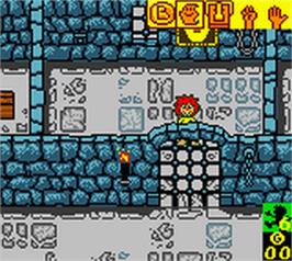 In game image of Pumuckls Abenteuer im Geisterschloss on the Nintendo Game Boy Color.