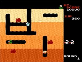 In game image of Dig Dug on the Nintendo NES.