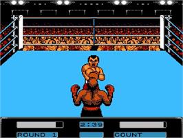 In game image of George Foreman's KO Boxing on the Nintendo NES.