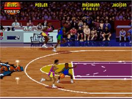 In game image of NBA Jam Tournament Edition on the Nintendo SNES.