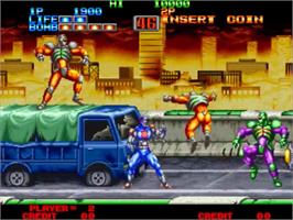 In game image of Eight Man on the SNK Neo-Geo MVS.