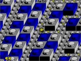 In game image of Pac-Mania on the Sega Master System.