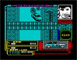In game image of Carlos Sainz on the Sinclair ZX Spectrum.