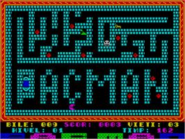 In game image of Pac-Man on the Sinclair ZX Spectrum.
