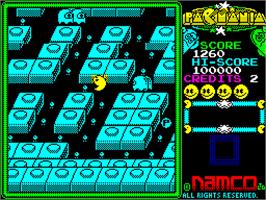 In game image of Pac-Mania on the Sinclair ZX Spectrum.