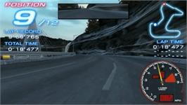 In game image of Ridge Racer on the Sony PSP.