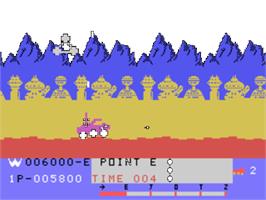In game image of Moon Patrol on the Texas Instruments TI 99/4A.