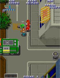 In game image of Gang Busters on the Arcade.