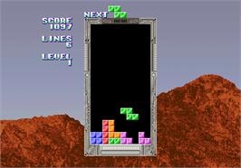 In game image of Tetris on the Arcade.