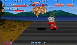 In game image of Ultra Toukon Densetsu on the Arcade.