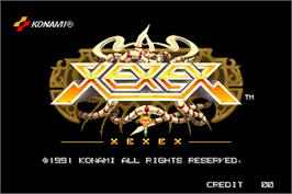 Title screen of Xexex on the Arcade.