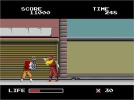 In game image of The Ninja Warriors on the NEC PC Engine.